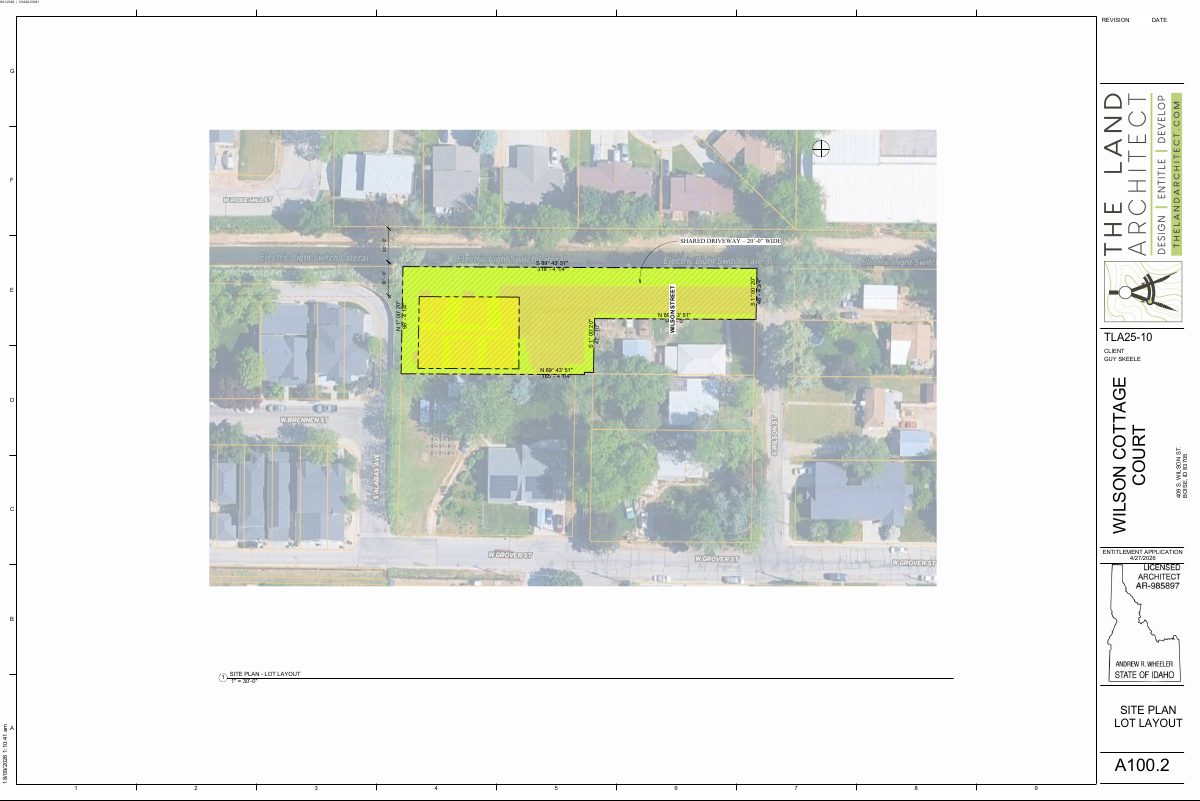 Site plan: Five detached cottage rentals proposed on half-acre lot, with parking near entrance